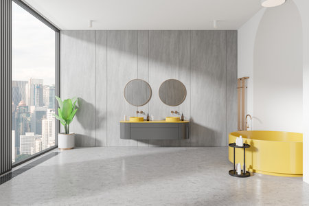 Spacious modern bathroom featuring yellow bathtub and sinks, large mirrors, and city view. Minimalist design with gray wall panels. 3D Renderingの写真素材