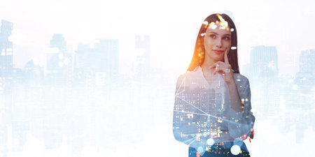 Pensive or dreaming businesswoman portrait silhouette, double exposure city skyscrapers and empty background. Concept of start up, business idea and future planの写真素材