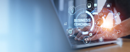 Man hands typing on laptop, business coaching hologram hud. Training or mentoring icons, internet network and e-learning. Concept of development and education. Copy spaceの写真素材