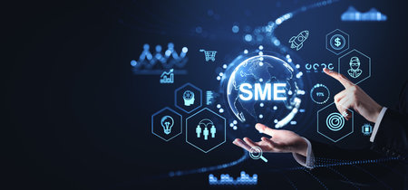 Businessman hands finger touch SME glowing hologram, management and strategy icons. Business marketing and development. Concept of small and medium-sized enterpriseの写真素材