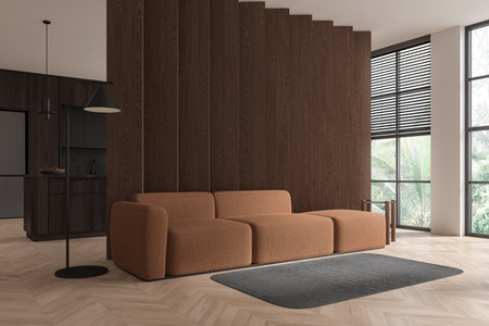Corner view of flat studio interior with sofa on hardwood floor, cooking cabinet with shelves and kitchenware. Contemporary apartment with panoramic window. 3D renderingの写真素材