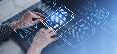 Woman hands closeup typing on laptop. Glowing electronic document files in row. Concept of future technologies, online certification and electronic signatureの写真素材
