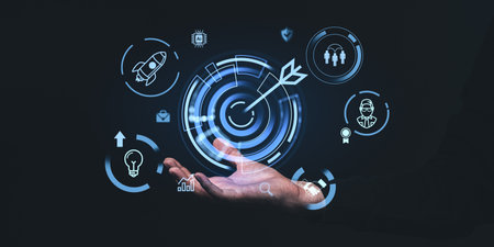 Man hand holding glowing business goal hologram, lightbulb and target. Concept of startup, strategy, analysis, achievement, development and future successの写真素材