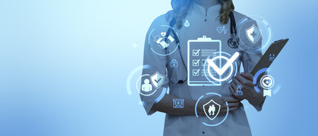 Doctor holding clipboard with medical icons overlay on blue background. Concept of healthcare, insurance, and medical checkupsの写真素材