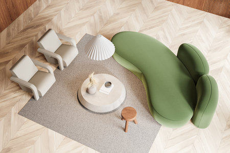 Top view of relax room interior with green sofa and armchairs, coffee table with art decoration, carpet on hardwood floor. Minimalist guest space. 3D renderingの写真素材