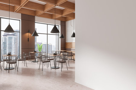 Blank wall mockup in modern restaurant interior with large windows, black hanging lamps, wooden ceiling, and city view. 3D Renderingの写真素材