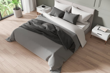 Top view of home bedroom interior with bed, nightstand with decoration on hardwood floor. Sleeping corner with panoramic window on tropics. 3D renderingの写真素材