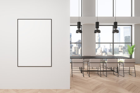 Blank framed poster mockup on a white wall in a modern dining room with large windows, showcasing a city view. 3D Renderingの写真素材