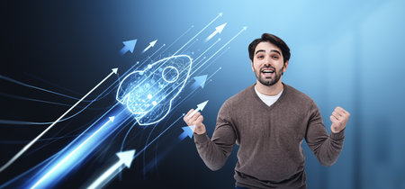 Happy man with fists up and flying rocket with glowing arrows, plan and achievement. Concept of business start up, career development, profit and successの写真素材