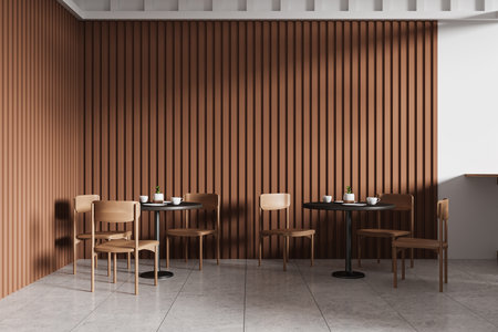 Cozy cafe interior showcasing wooden chairs and round tables against a stylish brown wall. Minimalist design concept. 3D Renderingの写真素材