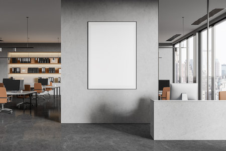 Blank framed poster on a concrete wall in a modern office interior with large windows, desks, and shelving. Concept of template. 3D Renderingの写真素材