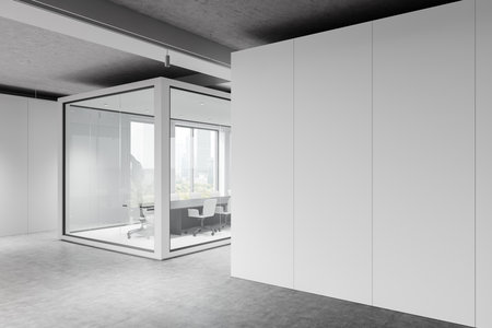Spacious modern office with a glass partition wall. Minimalist style, bright lighting, and empty space. Concept of workplace design. 3D Renderingの写真素材