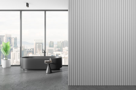 Home bathroom interior with black bathtub and side table with accessories, concrete floor. Bathing room with plant and panoramic window on Kuala Lumpur skyscrapers. Copy space empty wall. 3D renderingの写真素材