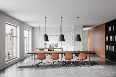 Spacious office interior with a large table and chairs, modern lighting, and city view windows. Business meeting environment. 3D Renderingの写真素材