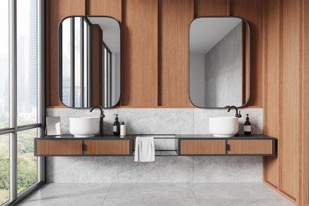 Contemporary bathroom with wood paneling, dual sinks, and mirrors. Minimalist style. City view from large windows. 3D Renderingの写真素材