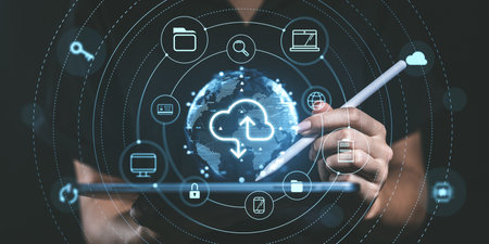 Person using tablet with cloud computing icons, digital style, dark background. Concept of online storage and technologyの写真素材