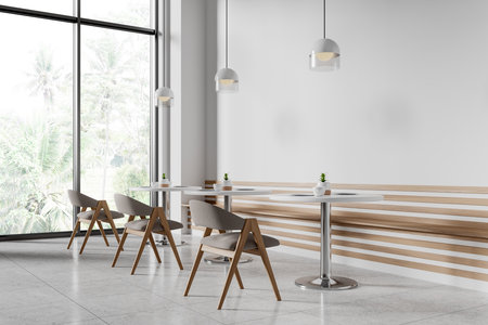 Modern cafe interior with wooden chairs and round tables. Minimalist style, large windows. Concept of contemporary design. 3D Renderingの写真素材