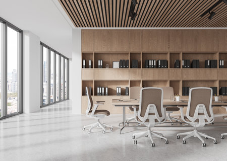 Spacious conference room with modern chairs and wooden shelves, large windows, city view in background. Business interior concept. 3D Renderingの写真素材