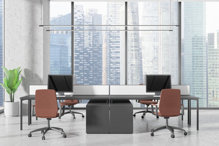 A modern office with desks, chairs, and computers in a minimalist design. Cityscape visible through large windows. Business workspace concept. 3D Renderingの写真素材