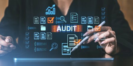 Digital audit concept with floating icons, hands using a tablet. Futuristic style on dark background. Concept of data analysisの写真素材