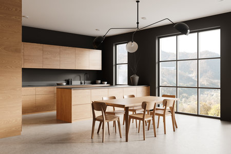 Modern kitchen interior showcasing wooden cabinets and dining table, with large windows and black walls. Concept of clean design. 3D Renderingの写真素材
