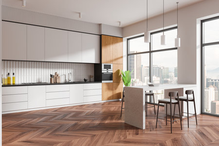 Corner view of home kitchen interior bar island and chairs, cabinet and kitchenware. Classical cooking space design with plant. Panoramic window on skyscrapers. 3D renderingの写真素材