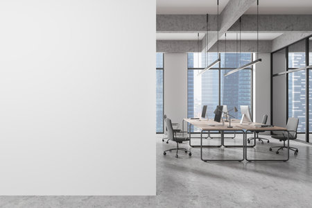 Empty office space with blank wall, sleek design, and large windows. Ideal for mockup or copy space. Modern interior style. 3D Renderingの写真素材