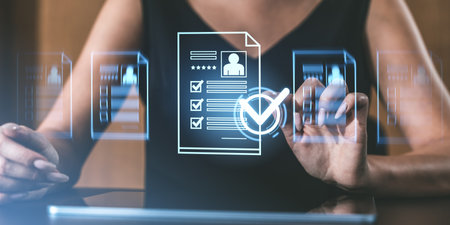 Woman interacting with transparent digital holographic documents and checklists in a futuristic interface, on a blurred background, concept of technology and recruitmentの写真素材