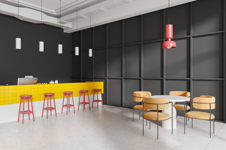 A modern cafe with a yellow tiled counter, orange chairs, and red bar stools. Minimalist lighting and decor on a gray wall background. Concept of a stylish eatery. 3D Renderingの写真素材