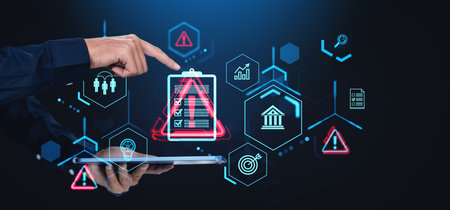 Hand pointing at digital icons for risk management and safety on a touchscreen interface, with a dark background. Concept of financial strategy and riskの写真素材