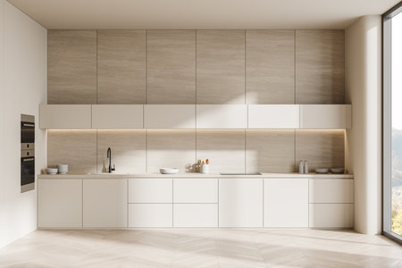 A modern kitchen with clean lines, light cabinetry, and wooden accents. Features minimalist design and large window with natural light. 3D Renderingの写真素材