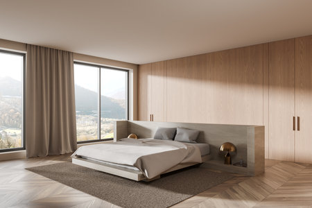 Modern bedroom featuring minimalist design, large windows with mountain view, wooden paneling, and neutral tones. Concept of contemporary home design. 3D Rendering.の写真素材