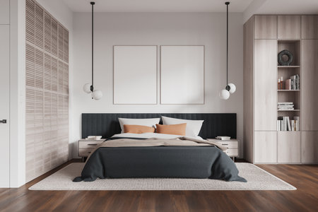 A modern bedroom with two blank framed posters above the bed. Neutral tones and minimalist design. Concept of interior display. 3D Renderingの写真素材