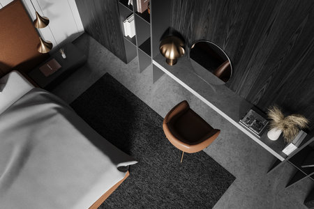 Top view of a modern bedroom, featuring brown furniture, a gray bedspread, and shelves with decorative items, all on a sleek background. 3D Renderingの写真素材