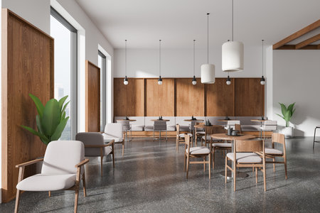 Spacious cafe interior with wooden chairs, tables, gray seating, green plants, and stylish lighting. Minimalist design on a polished floor. 3D Rendering.の写真素材