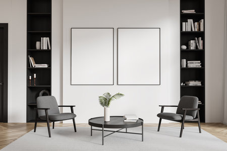 Living room showcasing two gray armchairs, a circular coffee table with decor, minimalist bookshelves, and two blank frames on a white wall background. Modern interior. 3D Rendering.の写真素材