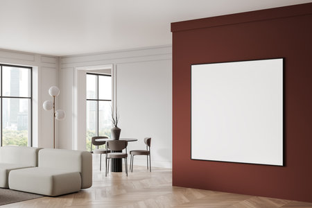 Contemporary living room featuring a beige sofa, dining set with chairs, blank canvas on a red accent wall, wooden floor and panoramic windows. 3D Rendering.の写真素材