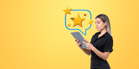 Woman holding tablet, review stars in speech bubble above, on a yellow background. Concept of online customer feedback, reputation, and serviceの写真素材