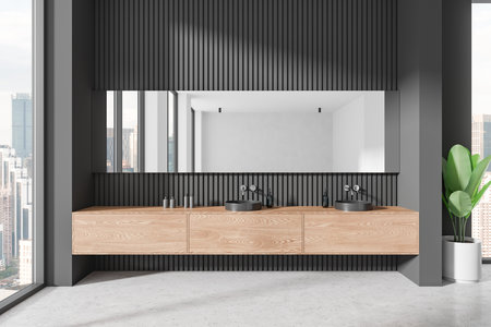 Modern bathroom interior featuring a wooden floating vanity withsinks, large mirror, vertical panel wall, and potted plant. Urban concept, 3D Renderingの写真素材