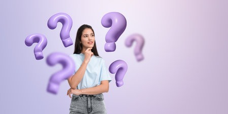 A thoughtful woman stands with purple question marks around her, set against a pastel gradient background, symbolizing curiosityの写真素材