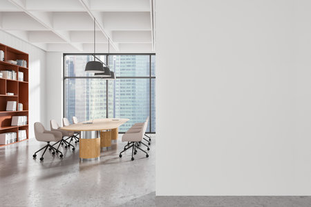Stylish conference room with a large wooden table, beige chairs, orange bookshelves, and tall windows in a bright office setting. Minimalist design. 3D Rendering.の写真素材