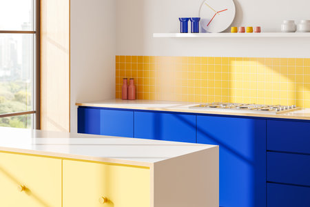 Contemporary kitchen with blue and yellow cabinets, yellow tiled backsplash, white countertop, and window view. Bright, stylish design concept. 3D Rendering.の写真素材