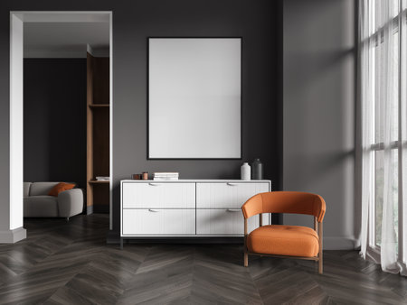 Blank wall poster mockup above a modern white cabinet, orange chair, dark walls, wooden flooring, large window, and cozy interior concept. 3D Rendering.の写真素材