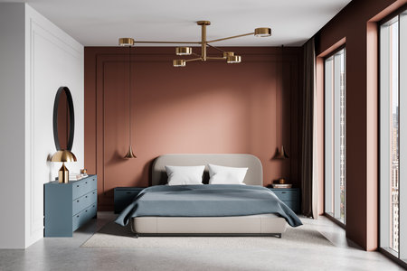 Elegant bedroom featuring a blue bed, blue dresser, gold accents, and warm terracotta walls. Modern decor on a concrete floor. Concept of luxury. 3D Rendering.の写真素材