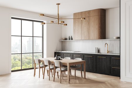 Contemporary kitchen design featuring wooden cabinetry, dining set, modern chandelier, large window with city view, and light wood flooring. 3D Renderingの写真素材