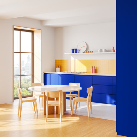 Modern kitchen interior with blue cabinets, yellow tiled backsplash, wooden chairs, round table, and large window. Contemporary household design. 3D Rendering.の写真素材