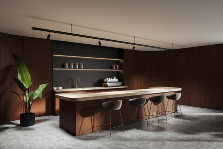 A minimalist kitchen interior with a sleek island, wooden surfaces, modern bar stools, and open shelving, complemented by a green potted plant. Warm lighting. 3D Rendering.の写真素材