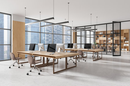Spacious open space office interior with modern desks, chairs, and computers, surrounded by glass partitions, bright city view, coworking concept. 3D Rendering.の写真素材