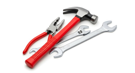 Hammer and wrench isolated on white background. Clipping path included.の素材