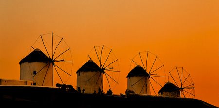 Famous Mykonos town windmills in a sunset, Mykonos island, Greece